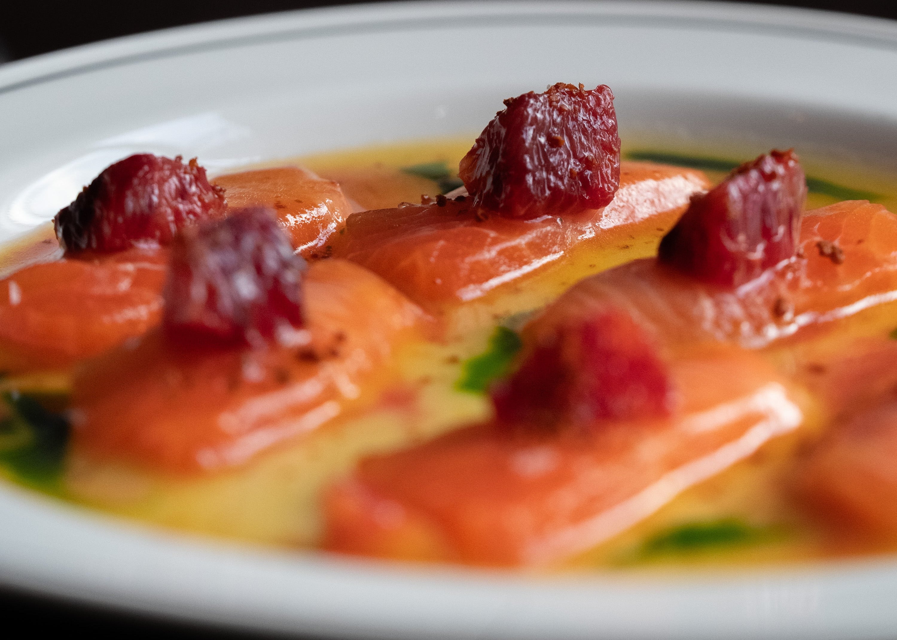 Close-up of a trout crudo dish